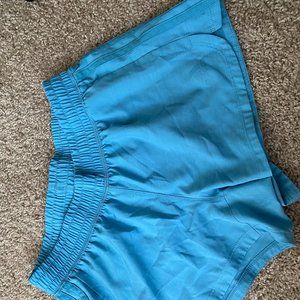Adidas turquoise blue running shorts